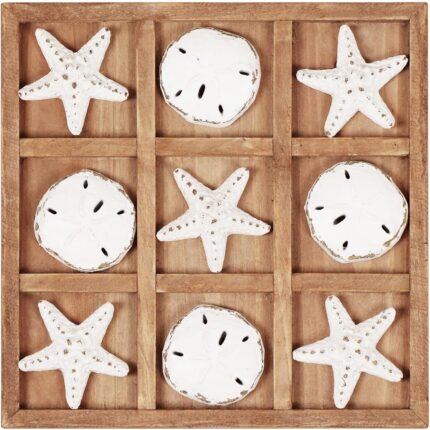 A distressed white NIKKY HOME Beach Tic Tac Toe game board with starfish and sand dollar resin pieces.