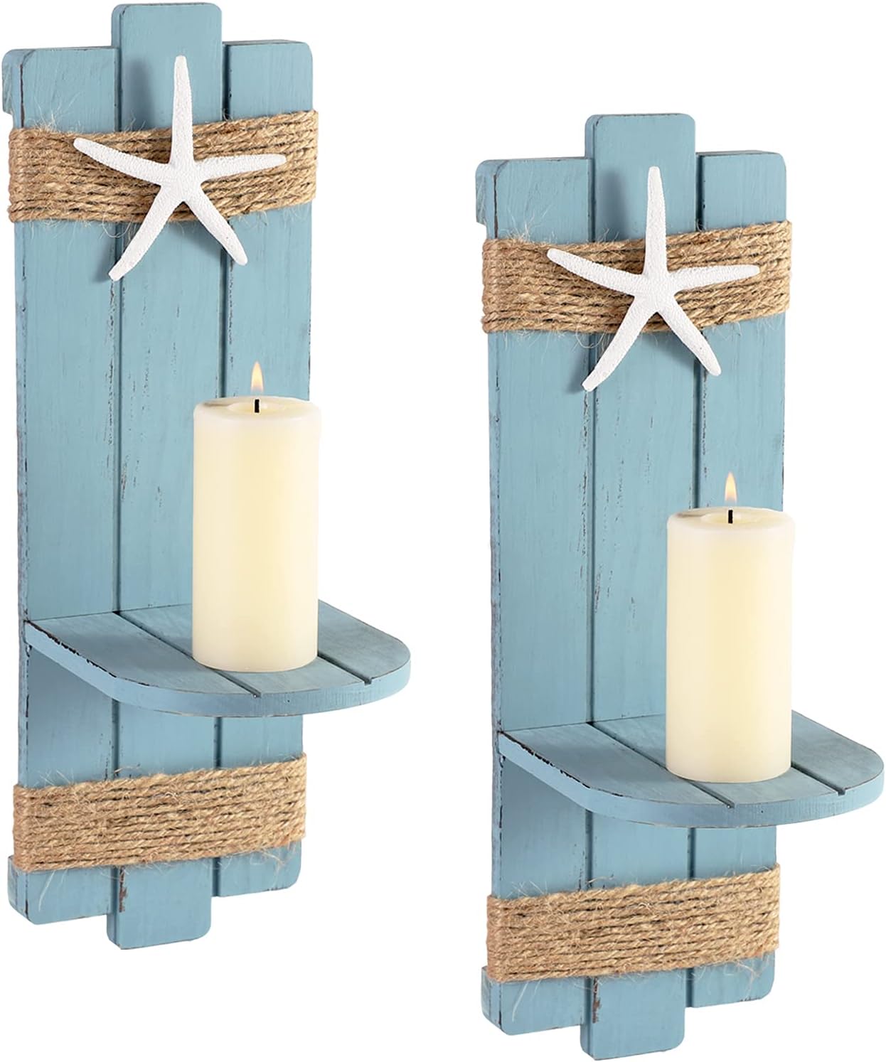 somto-blue-starfish-wood-candle-sconces-set-of-2-nautical-wall-decor-01 Two blue wooden starfish wall candle sconces with hemp rope accents, holding small candles, mounted against a light wall.