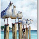 SUMGAR vertical coastal wall art with six curious seagulls on dock pilings, blue ocean background, 16x24 inches.