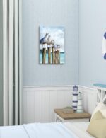 SUMGAR vertical coastal wall art with six curious seagulls on dock pilings, blue ocean background, 16x24 inches.