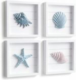 A set of four 7x7 inch framed 3D coastal wall art pieces featuring hand-painted seashells, conch shells, and starfish in past